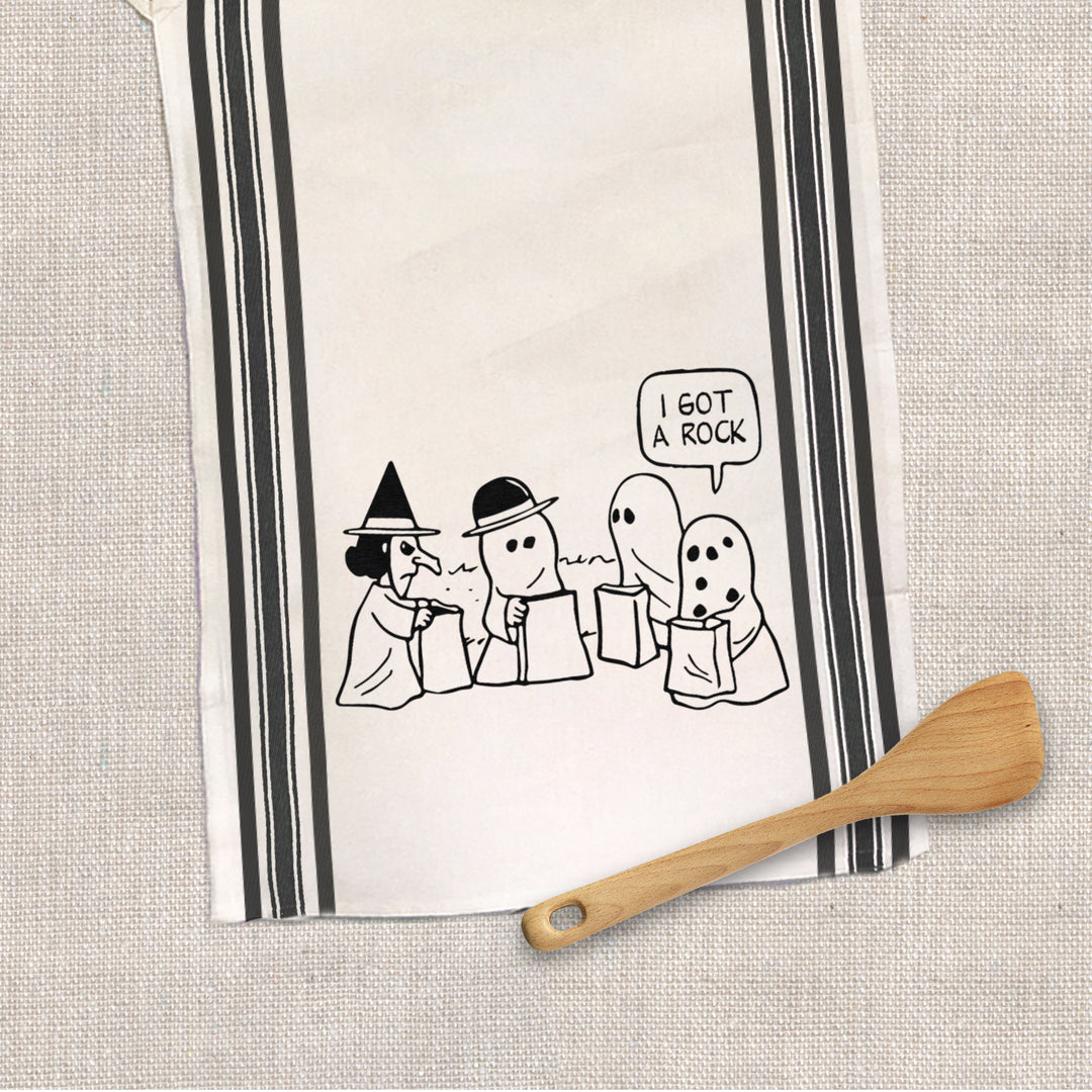 I got a rock funny tea towel inspired by Charlie Brown Great Pumpkin Halloween Funny Tea towels